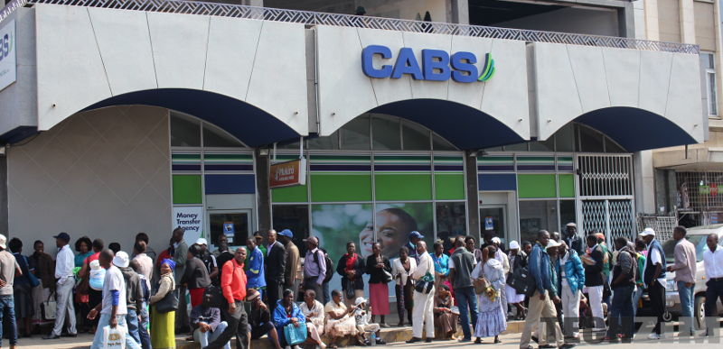 People queue up at a CABS branch