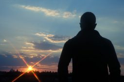 Silhouette of a man on a mountain