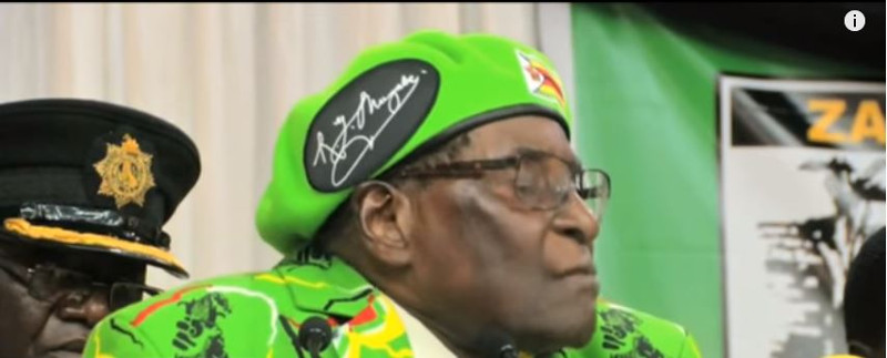 Robert Mugabe in green head gear