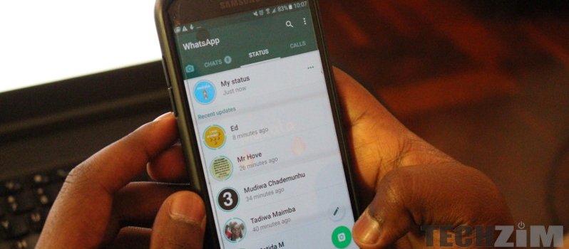 A phone with WhatsApp Messenger opened